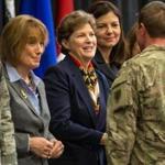 Governor Maggie Hassan (left), and US Senators Jeanne Shaheen (center) and Kelly Ayotte greeted members of the 237th Military Police Company of the New Hampshire Army National Guard at a homecoming event Sunday at Southern New Hampshire University.
