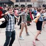 More than 250 people from dance studios in the Boston area participated in a flash mob at Boylston Plaza Sunday. 