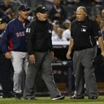 John Farrell objects to the overturning of call on replay in Sunday night’s game. Photo by Jeff Zelevansky/Getty Images