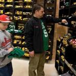 Bruins gear was predominant as Bob Gagne of Lincoln, R.I., and his son Tim shopped in the Proshop at TD Garden during a Celtics game last Friday.