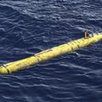 The Bluefin-21 Autonomous Underwater Vehicle sits in the water after being deployed from the Australian Defence Vessel Ocean Shield in the southern Indian Ocean on Thursday.
