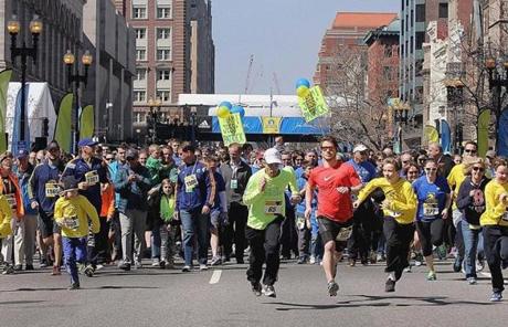 A Tribute Run for those affected by the bombings got underway on Boylston Street.
