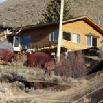 A Jackson slope has been slowly giving way, damaging one home and threatening others.