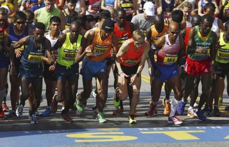 Athletes from the elite men's field started the 118th Boston Marathon.
