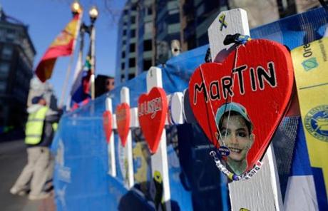 Memorials for the Marathon bombing victims are set up at the finish line.
