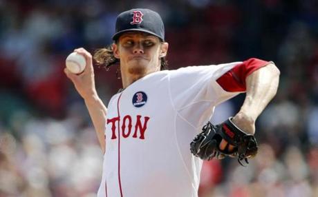 Clay Buchholz, one of three players to sleep at Fenway after Sunday's night game, gave up six runs in 2⅓ innings on Monday morning.
 (AP Photo/Winslow Townson)
