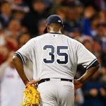 Michael Pineda of the Yankees walks to the dugout after his ejection in the second inning. Jared Wickerham/Getty Images
