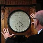  Michael Finn with a rare 19th-century clock at E.B. Horn Co.