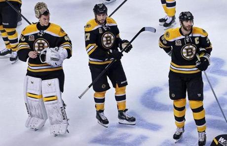 Bruins players were on the ice after the final horn sounded on their season.
