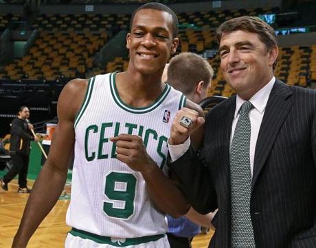 03/12/14: Boston, MA: Before the game the Celtics posed for their annual team picture at mid Wyc Grousbeck posed with his championship ring and point guard Rajon Rondo.
