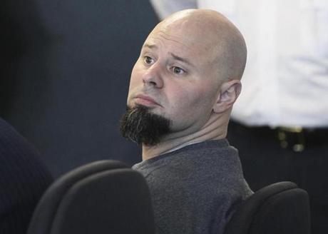 Jared Remy, son of Boston Red Sox baseball broadcaster Jerry Remy, sits in Middlesex Superior Court during a hearing Tuesday, May 27, 2014, in Woburn, Mass. Remy, 35, pleaded guilty to first-degree murder and other charges for stabbing his girlfriend Jennifer Martel to death in August 2013, and was immediately given the mandatory sentence of life in prison without parole. (AP Photo/The Boston Globe, Joanne Rathe, Pool)

