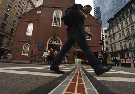 Tourists should find it easier to follow the historic Freedom Trail with the new thermoplastic strips.
