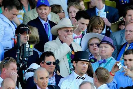 Steve Coburn (in white hat) believes only horses who run the Kentucky Derby should be eligible for the Triple Crown.

