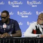 Heat stars LeBron James (left) and Dwyane Wade sat next to each other to discuss Miami?s series-ending loss to the Spurs in Game 5 Sunday, but they couldn?t be farther apart. (AP Photo/Tony Gutierrez) 