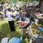 Jonathan Talley of Roxbury grilled food at Boston?s 18th annual Juneteenth celebration, held Saturday in Franklin Park. 