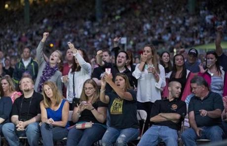Boston, MA 6/26/2014 Fans cheering on Billy Joel (cq) in concert at Fenway Park on Thursday June 26, 2014. (Matthew J. Lee/Globe staff) Topic: 27joel Reporter: Sarah Rodman
