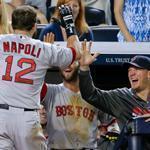 Mike Napoli returned to a happy Red Sox dugout after hitting a solo home run in the ninth inning. 