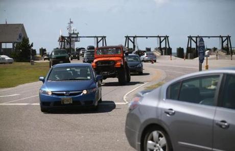 Motorists drove off a ferry from Ocracoke Island, N.C., as Arthur approached.
