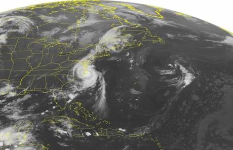 A NOAA satellite image taken early Friday showed Hurricane Arthur rolling across the Outer Banks of North Carolina.
