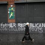 Graffiti along Falls Road in West Belfast, Northern Ireland, refers to former IRA members who took part in Boston College?s IRA oral history.