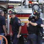 Firefighters on Sunday mourned the death of their colleague in a weekend fire at a 21-story building in Brooklyn, N.Y.