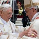 Pope Francis (right) met with Pope emeritus Benedict XVI during the canonisation mass of Popes John XXIII and John Paul II on St Peter's square at the Vatican on April 27, 2014. 