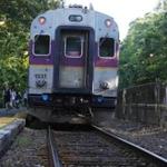 An MBTA commuter rail train stops at Wellesley Farms station earlier this week.