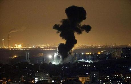 Smoke rose from buildings in Gaza after an Israeli strike.
