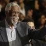 Bill Russell waves to the crowd during the NBA All Star game in February.