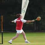 Rachel Green, who normally plays for East Preston in West Sussex, is shown playing stoolball for England Ladies.