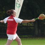 Rachel Green, who normally plays for East Preston in West Sussex, is shown playing stoolball for England Ladies.