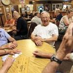 Chet Martel (center) of Pembroke, N.H., played cribbage with fellow veterans at the American Legion Henry J. Sweeney Post 2 in Manchester, N.H.