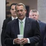 House Speaker John Boehner walked to a Republican conference to negotiate a border bill in the US Capitol on Friday.