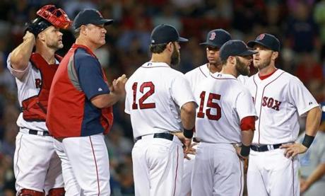 Manager John Farrell and the Red Sox will look very different beginning Friday night following a slew of trades Thursday.
