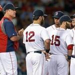Manager John Farrell and the Red Sox will look very different beginning Friday night following a slew of trades Thursday.