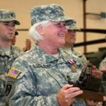 Sergeant 1st Class Mary Reilly-Callahan received the US Army Meritorious Service Medal and a personalized unit award during her retirement ceremony on Saturday.