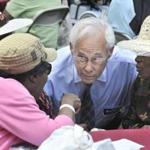 Donald Berwick met with senior citizens in Harvard Yard.