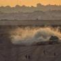 An Israeli tank rolled back from the Gaza Strip to a deployment near the border.