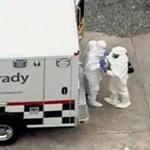 Protective gear was employed at Emory University Hospital in Atlanta. Two Americans with Ebola are getting an experimental drug.