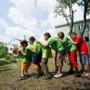 Campers recently enjoyed the spray from a hose at the YMCA day camp in East Boston.
