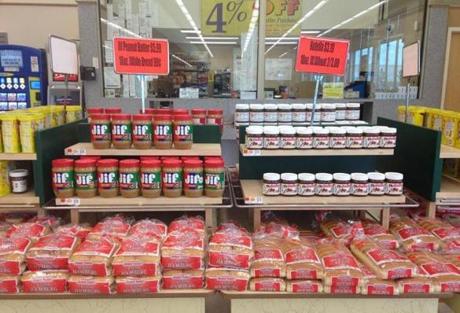 The produce and meat aisles may be barren, but there are still plenty of bargains at Market Basket -- and no lines.
