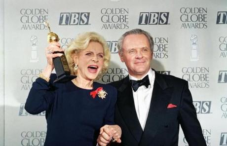 Bacall won a lifetime achievement award at the Golden Globes in 1993. She is pictured with Anthony Hopkins.
