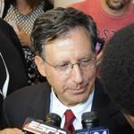Tom Werner, center, spoke to reporters after Rob Manfred?s election. 
