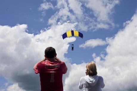Spectators watched skydivers through cameras and binoculars at Jumptown in Orange.
