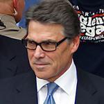 Texas Governor Rick Perry acknowledged supporters after he was fingerprinted in Texas Tuesday. Perry stood by his veto of funds for a Texas public corruption unit.  