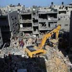 Palestinian emergency personnel went through the rubble of a building destroyed following an Israeli military strike in Rafah, Gaza Strip, on Thursday.