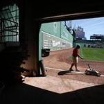 Derek Gauger painted the foul lines in the outfield at Fenway Park.