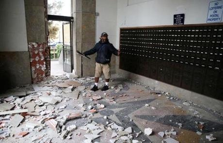 Jorge Sanchez looked at damage at the main post office in Napa.
