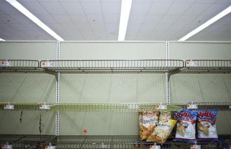 Many Market Basket stores, like this one in Somerville, have empty shelves.
