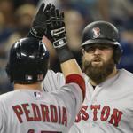 Mike Napoli hit a three-run home run in the 11th inning, part of a seven-run outburst.